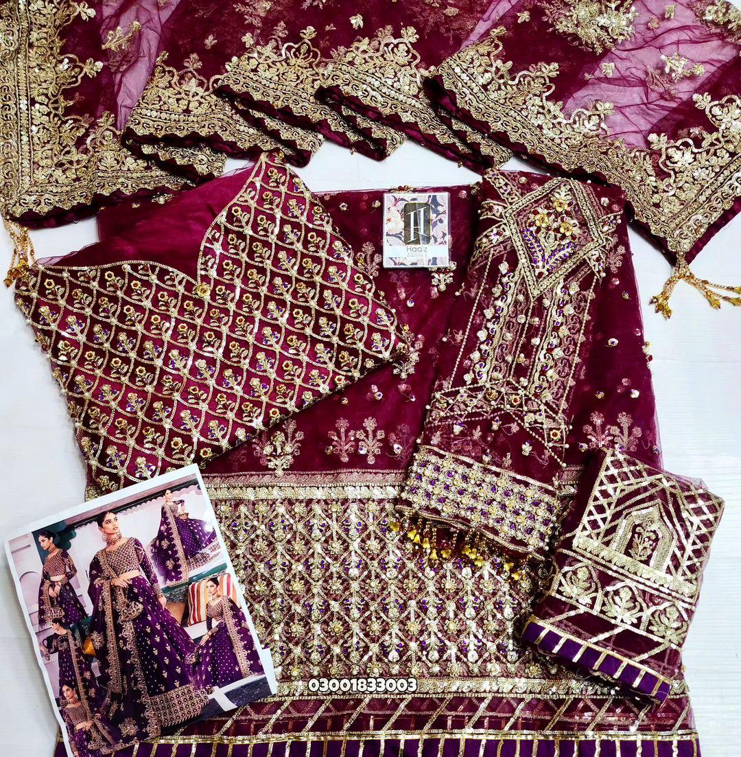 Royal Plum Bridal Lehenga with Heavy Gold Embroidery